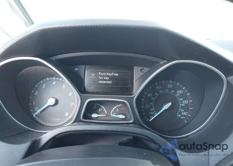 2014 Ford Focus Titanium из США, поврежденный, VIN 1FADP3J2XEL212933